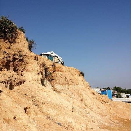 A house atop a sand dune in the Rohingya Refugee Camp.