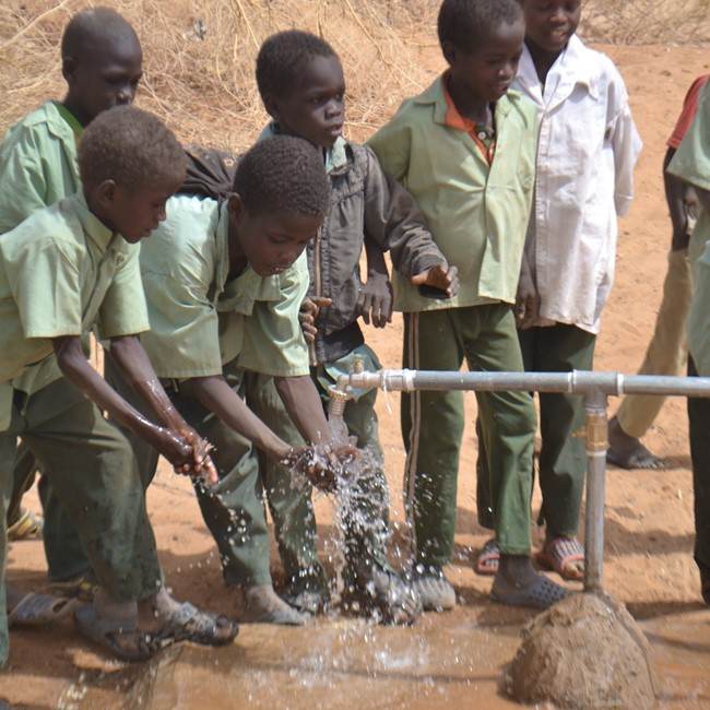 Children, water source.
