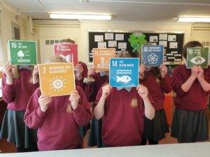 pupils using Practical Actioins SDG or Global Goals display materials