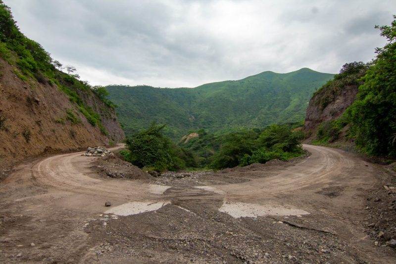 A resilient dirt road in a mountainous region, built to beat landslides.