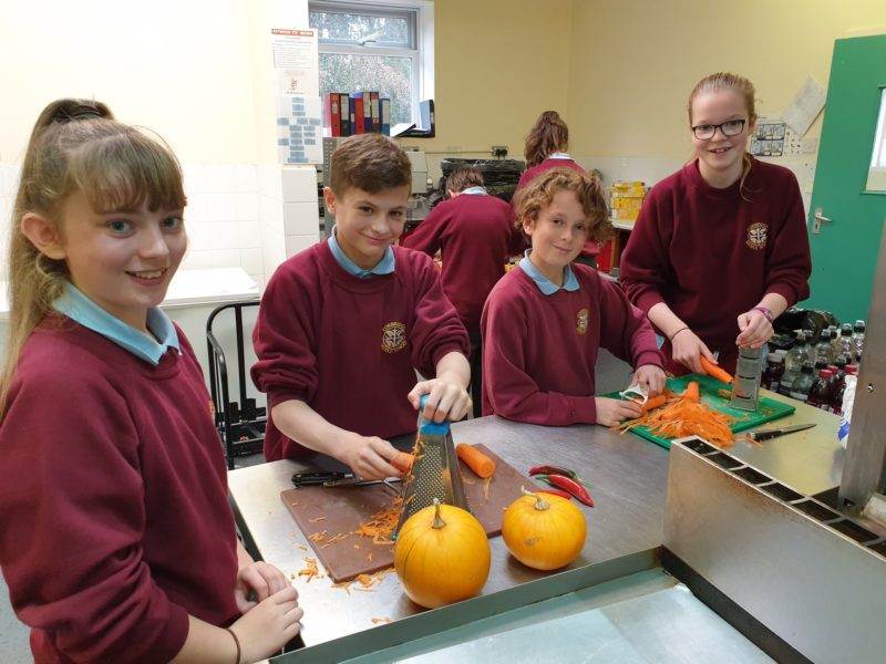 Primary aged pupils with pumpkins