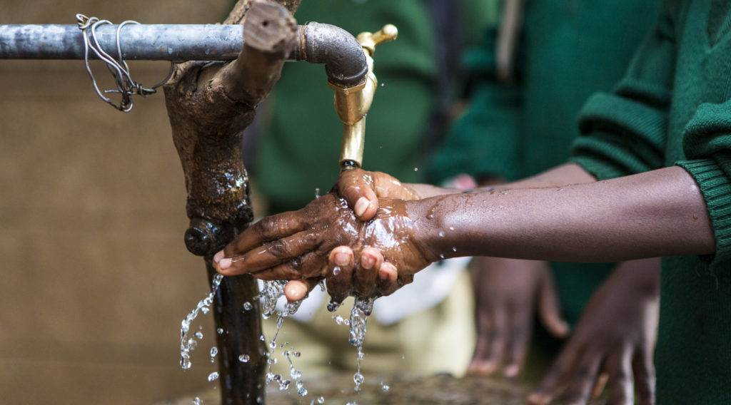 Children from Pandpieri primary washing their hands