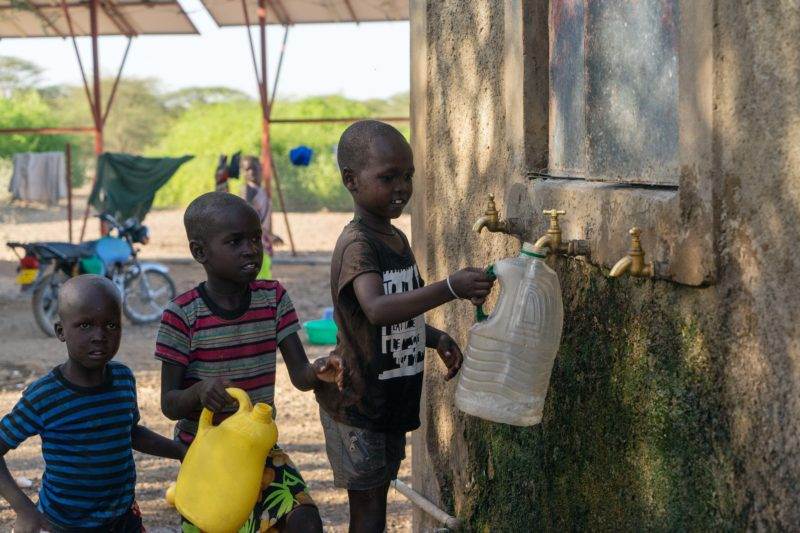 Children accessing clean water from a water point in Turkana