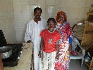 In Sudan, Aesha’s health has improved since she started using a low-smoke stove instead of burning wood.