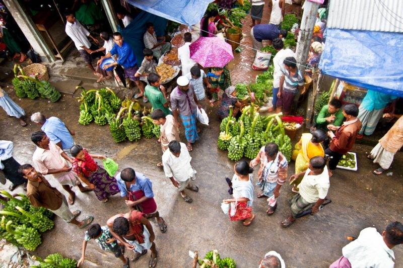 A crowd of empowered women at a market.