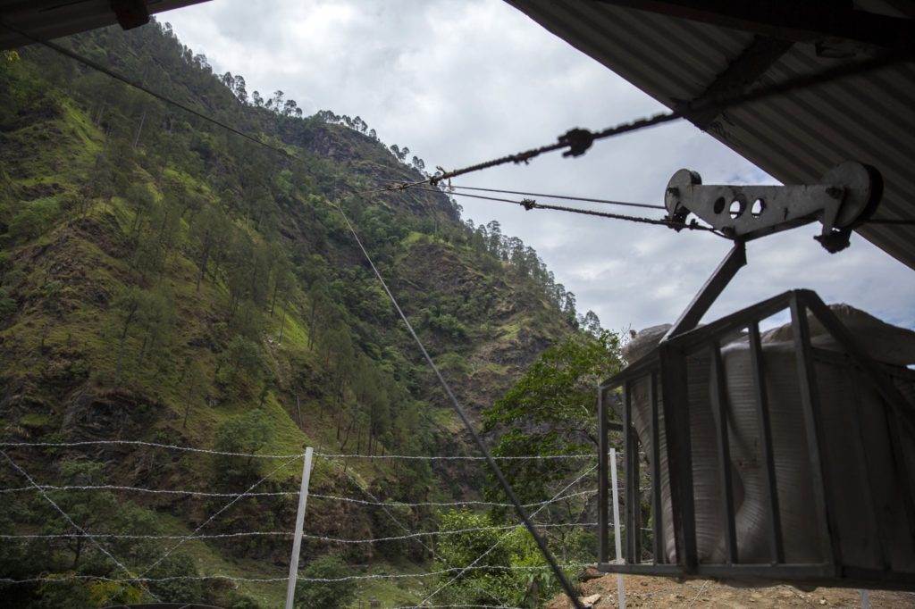 A transformative metal fence defying gravity in a community.