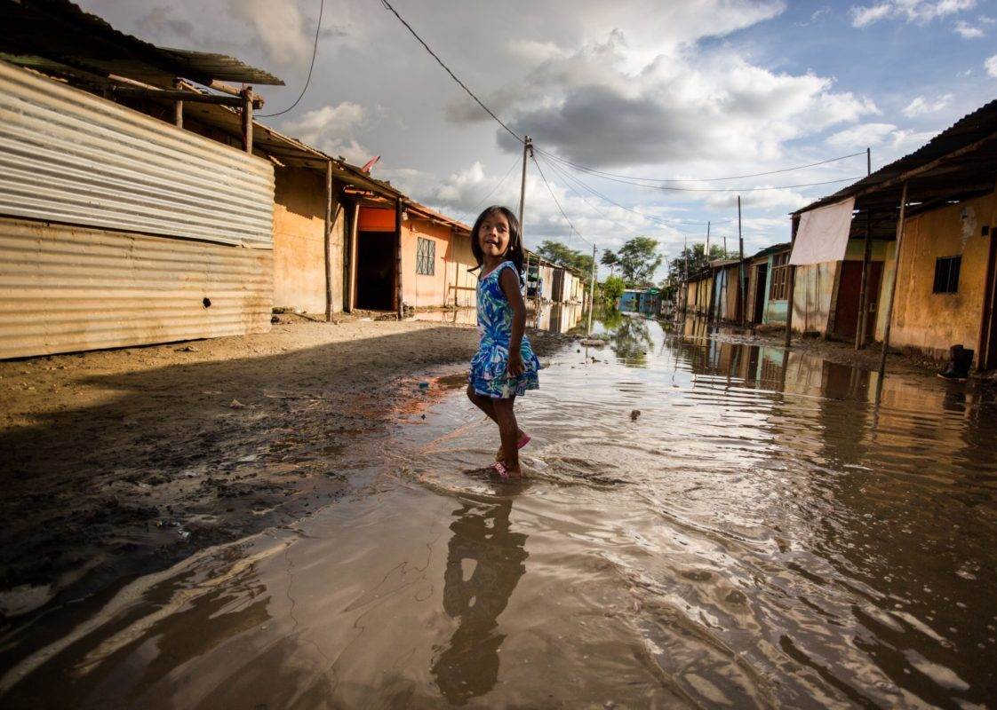 A girl amidst the floods.