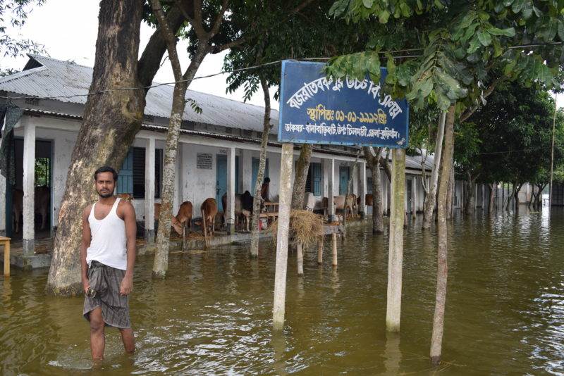 A man in a flooded area during London Climate Action Week.