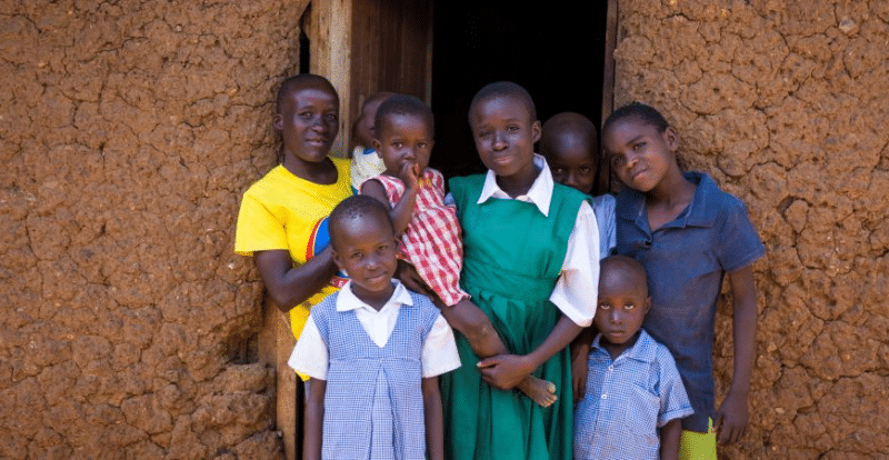 A group of children in a doorway, building futures.