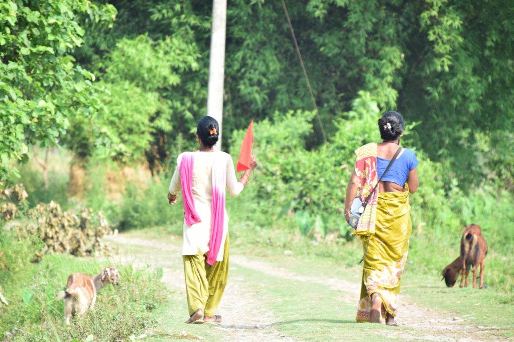 People in Nepal with colourful flags