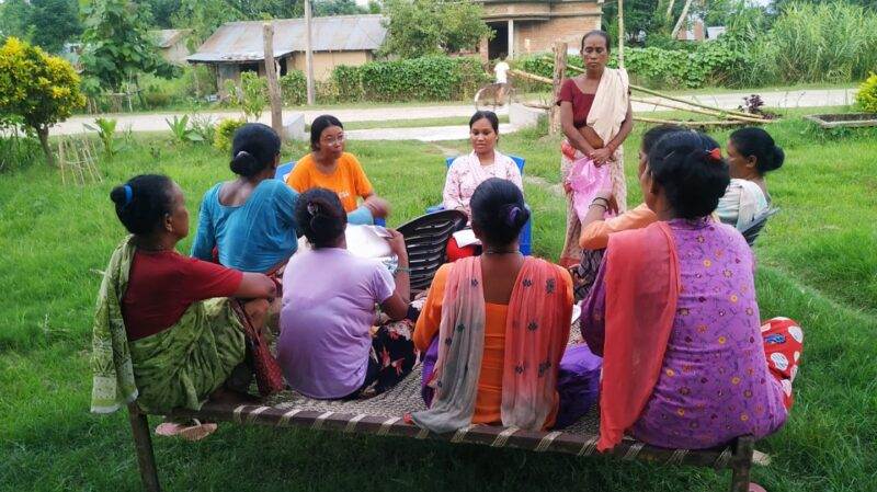 A group of flood-hit farmers in Nepal receive pay-out under climate insurance scheme.