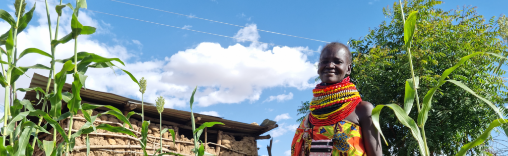 Ayanae stands on her farm in Turkana, Kenya