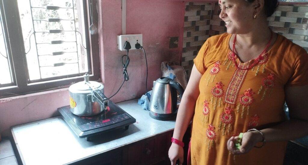 A woman experimenting with an innovative recipe for cleaner air in her kitchen.
