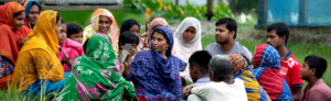 A group of people sitting and talking together in Bangladesh.