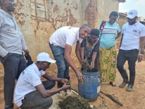 Farmers making their own organic fertiliser in Rwanda