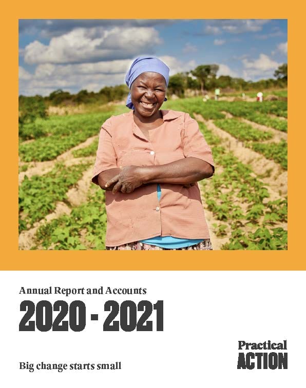A woman stands smiling in a crop field under a blue sky. Text reads: "Annual Report and Accounts 2020-2021. Practical Action. Big change starts small.