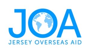 Logo for Jersey Overseas Aid. The letters "J", "O" and "A" are in blue, with the "O" containing an illustration of a globe. Below, the text reads "Jersey Overseas Aid" in blue capital letters.