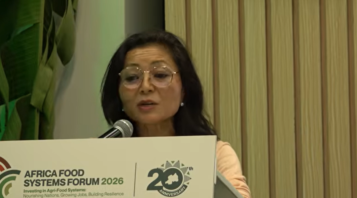 A woman speaks at a lectern during the Africa Food Systems Forum 2026 event.
